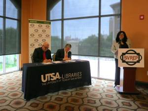 Antonio Gonzáles and Dr. Ricardo Romo signing the Deed.